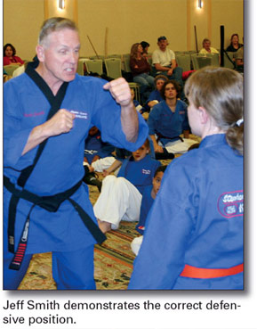 Jeff Smith demonstrates the correct defensive position.