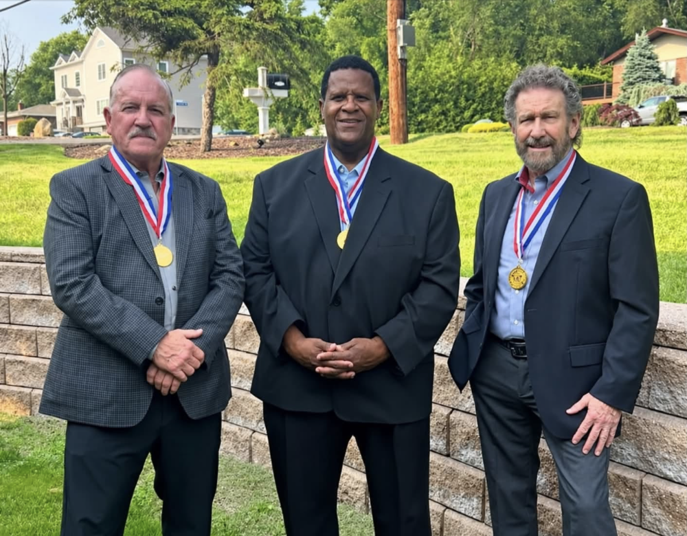 Grandmasters Jeff Smith, Gerard Robbins and Joe Corley wearing Official Taekwondo Hall of Fame medals