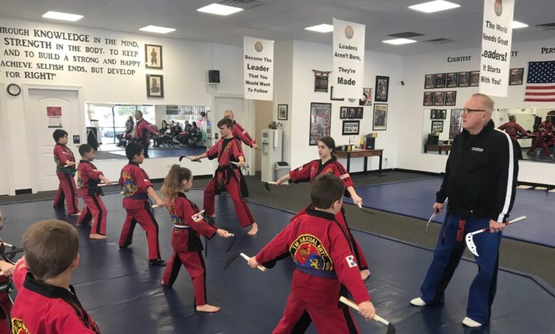 Grand Master Jeff Smith leading instruction on the training floor