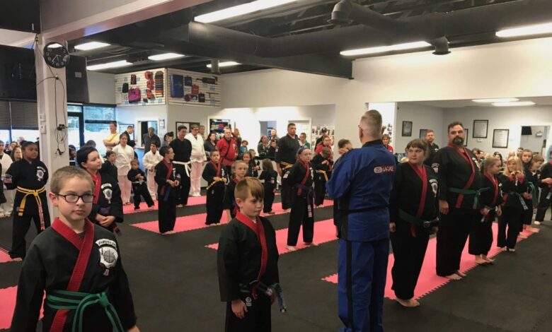 Grand Master Jeff Smith working with students during a class