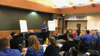 Grand Master Stephen Oliver teaching Martial Arts Wealth Mastery members at a training event